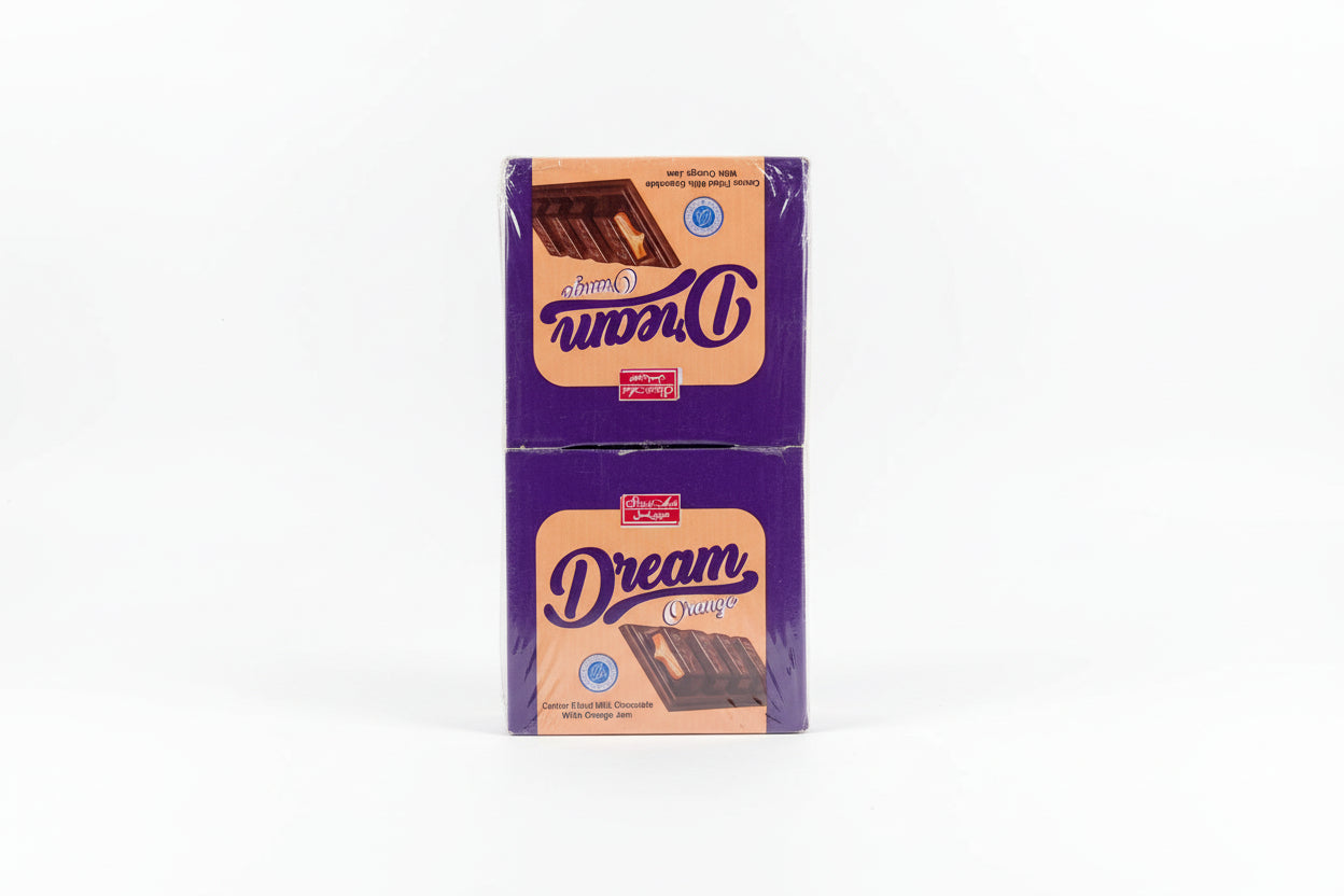 Packaged chocolate bar with 'Dream' branding on a textured surface