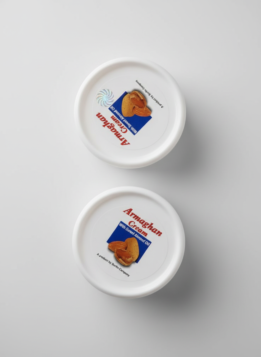 Two white containers with 'Armaghan Cream' branding