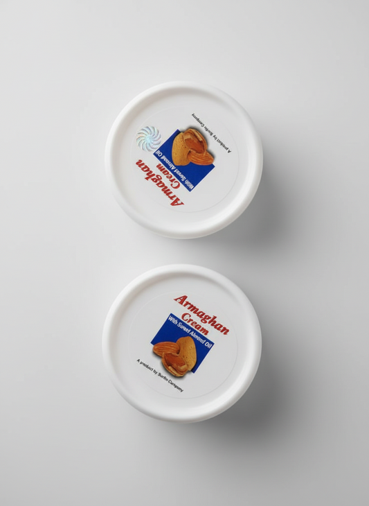 Two white containers with 'Armaghan Cream' branding