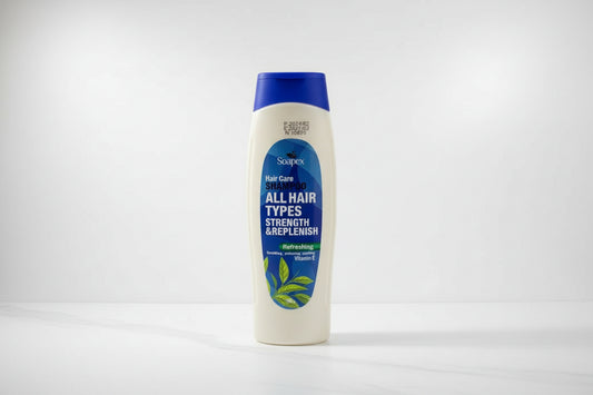 Three Soapex hair care shampoo bottles with different colored caps on a white background.