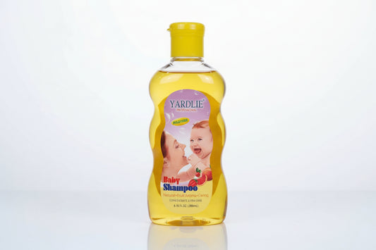 Two bottles of Yardlie baby shampoo with yellow surface.