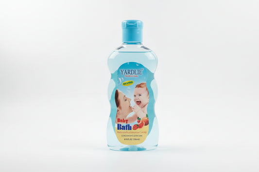 Two bottles of Yardlie Baby Bath with baby images on the labels against a blurred background.