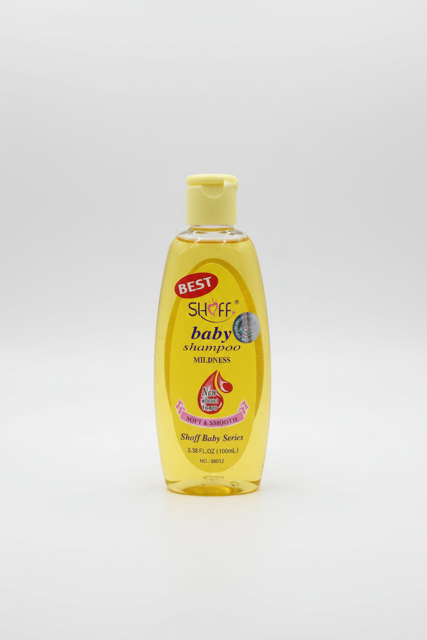 Two bottles of Shoff baby shampoo with yellow labels on a reflective surface.