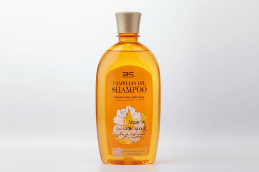 Row of Camellia Shampoo bottles on a shelf
