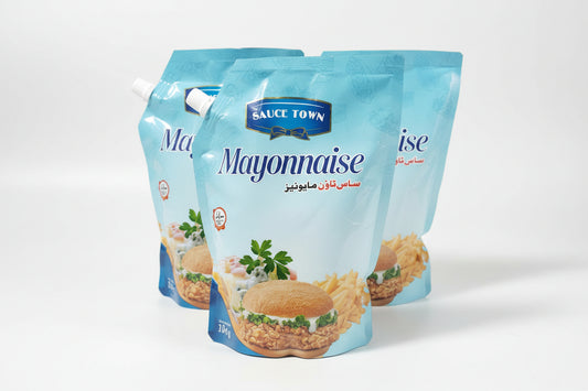 Two packages of Sauce Town mayonnaise on a surface with a visible brand logo.