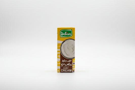 Five boxes of different brands of cream on a reflective surface