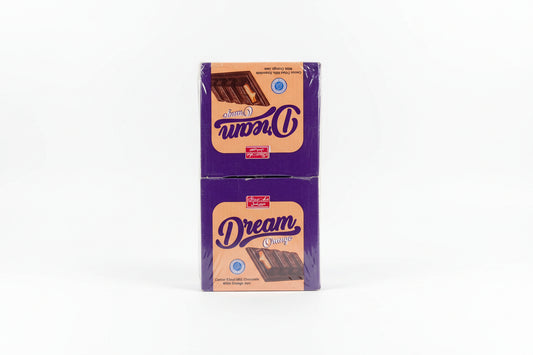 Packaged chocolate bar with 'Dream' branding on a textured surface