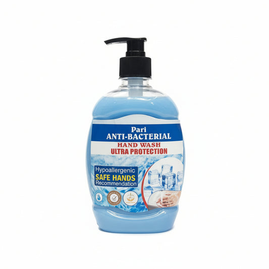 Three bottles of Pari Anti-Bacterial Hand Wash on a grass-like surface with a store setting in the background.